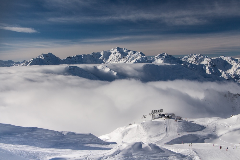 Ski lift in St. Anton am Arlberg,Beautiful winter landscape in the Alps, near St. Anton am Arlberg, above the clouds with sunshine
